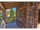 Balcony features stone facade, iron railing, and beautiful surrounding mountain views at 264 Crestview Dr, Las Vegas, NV 89124