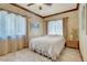 Bedroom featuring marble flooring, large windows with curtains, and accent walls at 264 Crestview Dr, Las Vegas, NV 89124