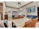 Dining room with fireplace, beamed ceilings, and large table at 264 Crestview Dr, Las Vegas, NV 89124