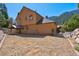 Back view of the house showing patio and mountain views at 264 Crestview Dr, Las Vegas, NV 89124