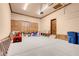 Large garage with custom wood storage cabinets and epoxy flooring at 264 Crestview Dr, Las Vegas, NV 89124