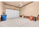 Spacious garage with an automatic door and room for vehicles and storage at 264 Crestview Dr, Las Vegas, NV 89124