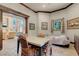 Bright living room with tile flooring, large windows, and adjoins another room at 264 Crestview Dr, Las Vegas, NV 89124