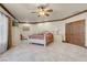 Airy main bedroom featuring a tiled floor, neutral walls, and wood trim at 264 Crestview Dr, Las Vegas, NV 89124