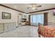 Main bedroom boasting a fireplace, large windows, and neutral walls at 264 Crestview Dr, Las Vegas, NV 89124