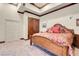 Main bedroom with beamed ceilings, tile flooring, and ensuite bathroom at 264 Crestview Dr, Las Vegas, NV 89124