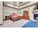 Bright main bedroom with beamed ceilings, a stone fireplace, and elegant furnishings at 264 Crestview Dr, Las Vegas, NV 89124