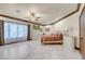 Spacious main bedroom featuring neutral walls, tiled floor, and large windows at 264 Crestview Dr, Las Vegas, NV 89124