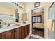 Bright bathroom with double sinks, spacious countertops, and ample natural light at 2705 Cornish Hen Ave, North Las Vegas, NV 89084