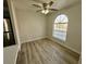 Bright dining area with wood flooring, ceiling fan and natural light at 2964 Juniper Hills Blvd # 202, Las Vegas, NV 89142