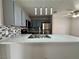 Modern kitchen showcases sleek countertops, stainless steel appliances, and pendant lighting at 2964 Juniper Hills Blvd # 202, Las Vegas, NV 89142