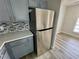 Close up view of the kitchen with stainless steel appliances and ample counter space at 2964 Juniper Hills Blvd # 202, Las Vegas, NV 89142
