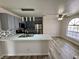 Bright kitchen features stainless steel appliances, modern countertops and stylish backsplash at 2964 Juniper Hills Blvd # 202, Las Vegas, NV 89142