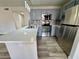 Kitchen with stainless steel appliances, quartz countertops and gray shaker cabinets at 2964 Juniper Hills Blvd # 202, Las Vegas, NV 89142