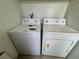 Compact laundry room with washer and dryer at 2964 Juniper Hills Blvd # 202, Las Vegas, NV 89142