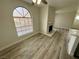 Living room with wood flooring, fireplace, and arched window at 2964 Juniper Hills Blvd # 202, Las Vegas, NV 89142