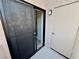Exterior view of patio with sliding screen door and outdoor storage closet at 2964 Juniper Hills Blvd # 202, Las Vegas, NV 89142