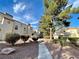 Exterior view of walkway with multiple building exteriors at 2964 Juniper Hills Blvd # 202, Las Vegas, NV 89142