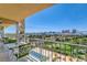 Balcony with seating and golf course, city and Las Vegas Strip views at 3111 Bel Air Dr # 12C, Las Vegas, NV 89109