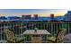 Relax on the balcony with city views from this outdoor seating area at 3111 Bel Air Dr # 12C, Las Vegas, NV 89109