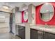 Well-lit bathroom features dual sinks, vanity areas, and modern fixtures at 3111 Bel Air Dr # 12C, Las Vegas, NV 89109