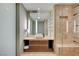 Contemporary bathroom with a vessel sink, sleek vanity, and luxurious glass-enclosed shower with tile surround at 3722 Las Vegas Blvd # 1609, Las Vegas, NV 89158