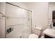 Modern bathroom featuring a shower with glass door, and built in shelving at 3746 Bright Aquarius Ln, Henderson, NV 89052