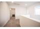 Upstairs landing showcasing hallway leading to bedrooms at 3746 Bright Aquarius Ln, Henderson, NV 89052