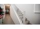 Bright hallway with a staircase, leading to the upper levels of this stylish home at 3746 Bright Aquarius Ln, Henderson, NV 89052