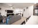 Spacious living room is connected to the dining and kitchen area, ideal for hosting guests at 3746 Bright Aquarius Ln, Henderson, NV 89052
