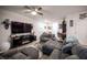 Comfortable living space with a large television and cozy seating arrangement at 3746 Bright Aquarius Ln, Henderson, NV 89052