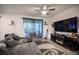 Relaxing living area with a large television and comfortable seating at 3746 Bright Aquarius Ln, Henderson, NV 89052