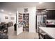 Well-stocked pantry with ample shelving, adjacent to a modern kitchen with stainless appliances at 3746 Bright Aquarius Ln, Henderson, NV 89052