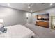 Large main bedroom featuring a dresser with television, recessed lighting, and neutral paint at 415 Point Sur Ave, Las Vegas, NV 89138