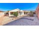 Serene backyard with desert landscaping and covered patios at 473 Elm Crest Pl, Henderson, NV 89012