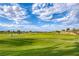 Expansive golf course with vibrant green fairways and mature trees, perfect for avid golfers and scenic views at 473 Elm Crest Pl, Henderson, NV 89012