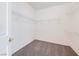 Bright walk-in closet featuring white wire shelving for optimal storage and gray carpeting at 473 Elm Crest Pl, Henderson, NV 89012