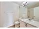 Bright bathroom with vanity sink, mirror, and tiled floors at 5000 Red Rock St # 105, Las Vegas, NV 89118