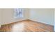 Spacious bedroom with wood-look laminate flooring and bright natural light at 5000 Red Rock St # 105, Las Vegas, NV 89118