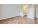 Open bedroom with laminate flooring, closet, and doorway at 5000 Red Rock St # 105, Las Vegas, NV 89118
