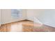 Bright bedroom with wood-look flooring and window at 5000 Red Rock St # 105, Las Vegas, NV 89118
