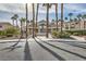 Attractive clubhouse framed by palm trees in this well-maintained community at 5000 Red Rock St # 105, Las Vegas, NV 89118