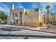 Two-story condo featuring stucco exterior, sidewalk access, and multiple windows allowing for natural light at 5000 Red Rock St # 105, Las Vegas, NV 89118