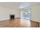 Bright living room with fireplace and sliding glass door at 5000 Red Rock St # 105, Las Vegas, NV 89118