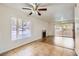 Inviting living room with fireplace, tile flooring, and sliding doors to the outdoor area at 5000 Red Rock St # 105, Las Vegas, NV 89118