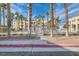 View of the Laguna Del Rey community pool and surrounding landscaped grounds at 5000 Red Rock St # 105, Las Vegas, NV 89118