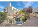 Charming water feature amidst lush greenery in a well-maintained community at 5000 Red Rock St # 105, Las Vegas, NV 89118