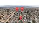 Aerial view of the neighborhood with a catholic church and E. Charleston Blvd close by at 5439 Pomeroy Cir, Las Vegas, NV 89142