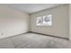 Bedroom featuring a large window, carpet and neutral walls at 5439 Pomeroy Cir, Las Vegas, NV 89142