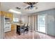 Kitchen featuring oak cabinets, stainless steel appliances, and an island with seating at 5439 Pomeroy Cir, Las Vegas, NV 89142